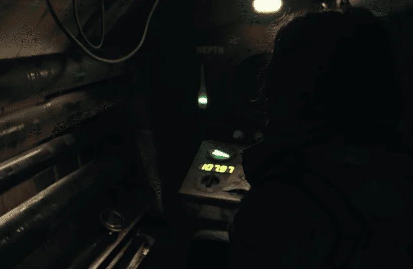 Iron Lung movie, a convict travels through a blood ocean for resources, Markiplier, Mark Fischbach, independent film and self distributing, limited release, Jan 2026, convict being sealed into submarine