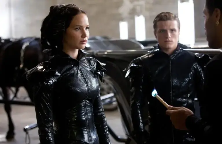 Jennifer Lawrence and Josh Hutchinson in The Hunger Games (2012)