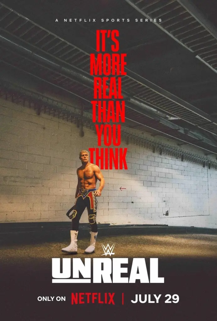 A wrestler stands confidently in a dim corridor. Bold red text reads "It's More Real Than You Think." Title: "WWE Unreal," debuting July 29 on Netflix.