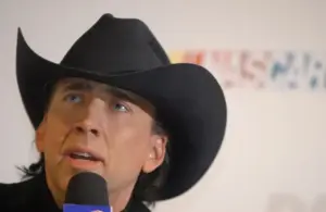 Actor Nicolas Cage, grand marshall of the Nascar Nextel Cup Series Daytona 500, speaks with the media prior to the race at Daytona International Speedway.