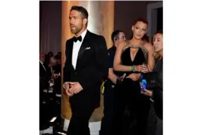 Ryan Reynolds and Blake Lively arrive at the International Ballroom for the start of the 74th Golden Globe Awards at Beverly Hilton.