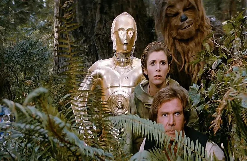 Harrison Ford, Anthony Daniels, Carrie Fisher, and Peter Mayhew in Star Wars: Episode VI - Return of the Jedi (1983)