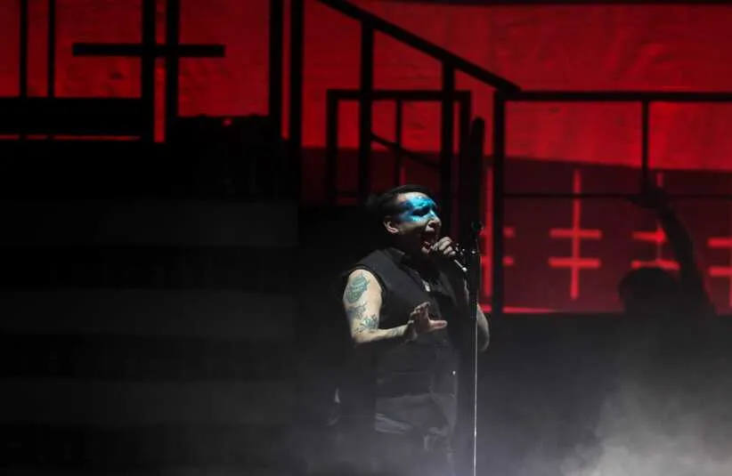 Marilyn Manson performs \"Angel with the Scabbed Wings\" on Tuesday, July 23, at the Denny Sanford Premier Center. Zombiemanson003