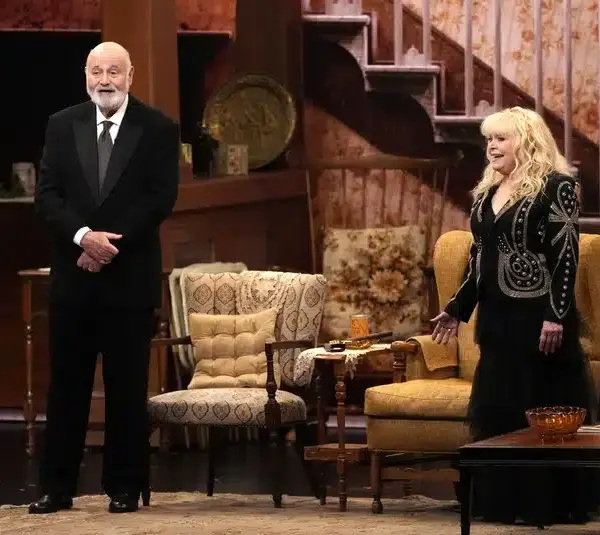 Jan 15, 2024; Los Angeles, CA, USA; Rob Reiner (left) and Sally Struthers introduce the In Memoriam segment while standing in an All in the Family set on stage during the 75th Emmy Awards at the Peacock Theater in Los Angeles on Monday, Jan. 15, 2024. Mandatory Credit: Robert Hanashiro-USA TODAY