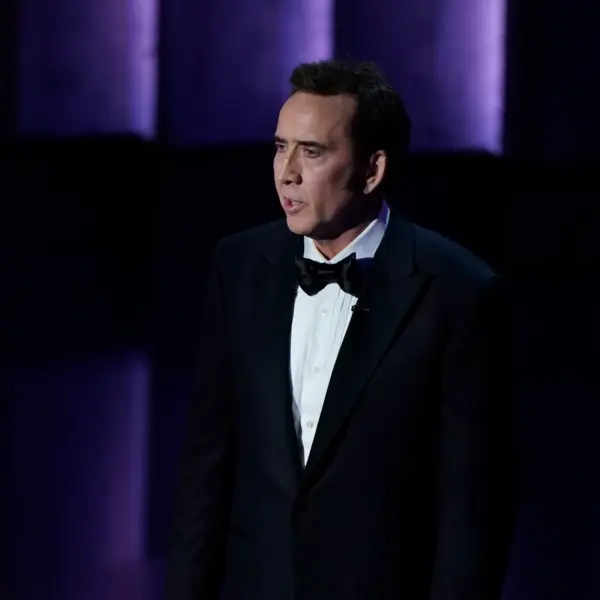 Mar 10, 2024; Los Angeles, CA, USA; Nicolas Cage presents the award for best actor in a leading role during the 96th Oscars at the Dolby Theatre at Ovation Hollywood in Los Angeles on Sunday, March 10, 2024.. Mandatory Credit: Jack Gruber-USA TODAY. Cage is set to be in Spider-Noir in 2026