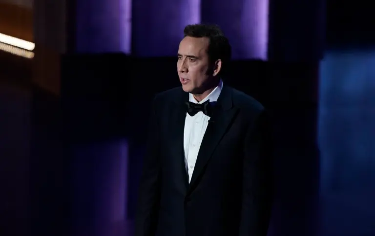 Mar 10, 2024; Los Angeles, CA, USA; Nicolas Cage presents the award for best actor in a leading role during the 96th Oscars at the Dolby Theatre at Ovation Hollywood in Los Angeles on Sunday, March 10, 2024.. Mandatory Credit: Jack Gruber-USA TODAY. Cage is set to be in Spider-Noir in 2026