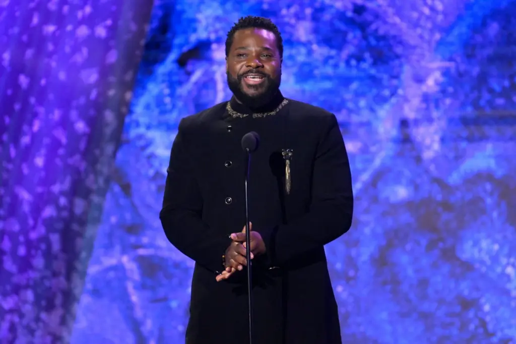 Feb 5, 2023; Los Angeles, CA, USA; Malcolm-Jamal Warner presents awards during the Grammy Awards Premiere Ceremony at the Microsoft Theater in Los Angeles on Sunday, Feb. 5, 2023.. Mandatory Credit: Robert Hanashiro-USA TODAY