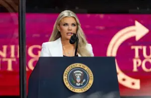Erika Kirk speaks during a memorial service honoring Charlie Kirk at State Farm Stadium in Glendale on Sept. 21, 2025. Bari Weiss of CBS news