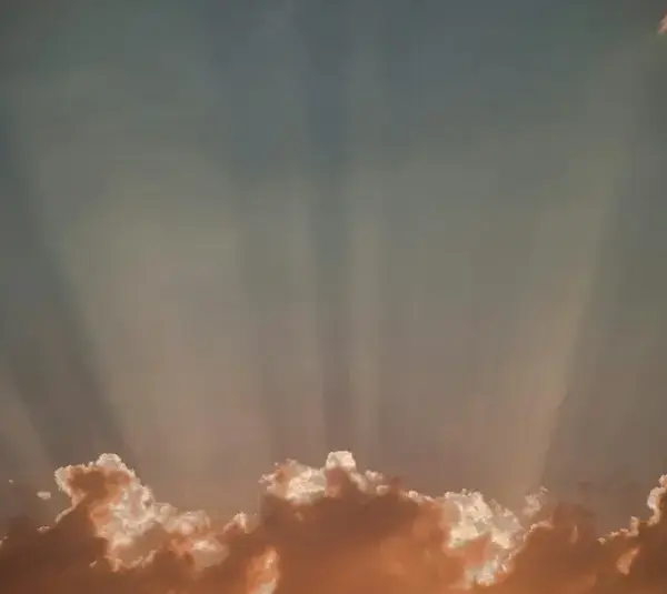 blue sky, white clouds, and sun rays, daily devotion