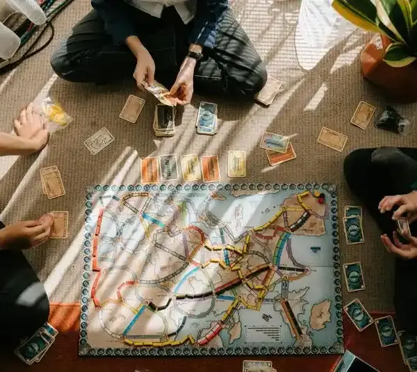 Best Travel Board Games Group playing Ticket to Ride/ Board Games v Video Games: The Brutal Truth