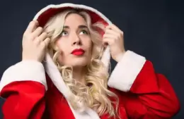 A woman with a curly hair as one of the great holiday hairstyles you can do.