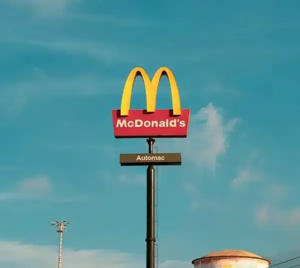 McDonalds sign. Disney has a new Happy Meal option.