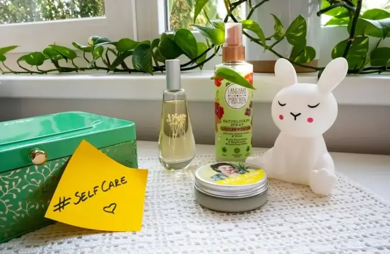 Dresser with cosmetic products and a sticky note with the hashtag #selfcare on it, self-care, self care