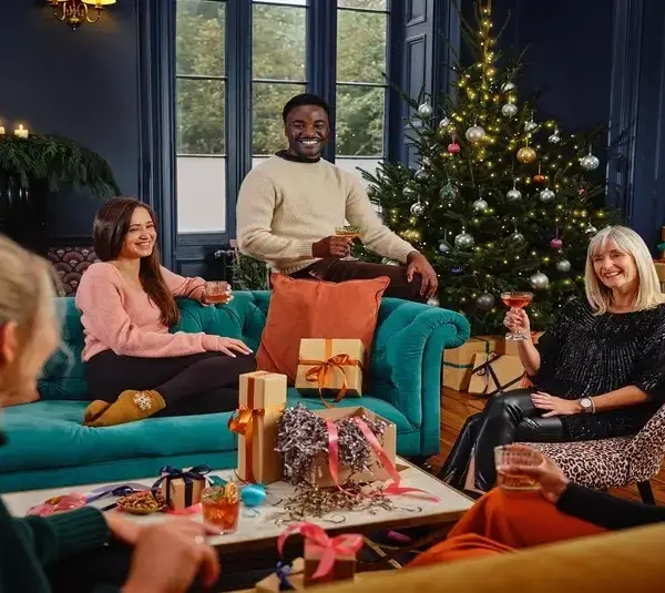 people sharing drinks on Christmas, family, friends, conversation starters