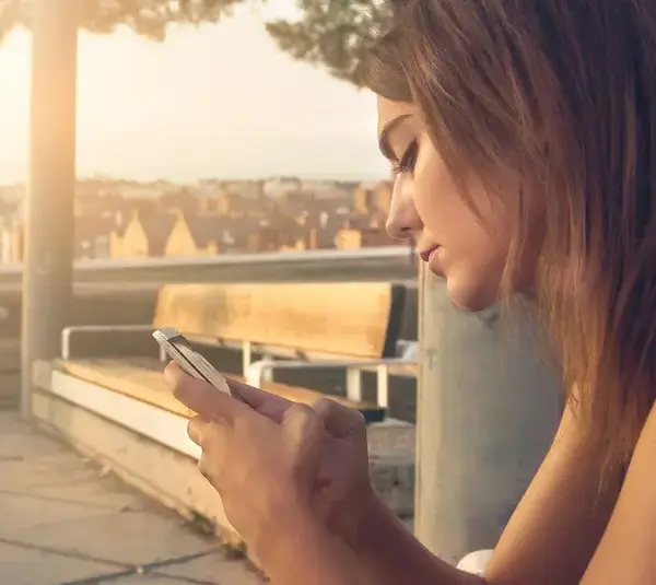 a woman using a cell phone, mental health, AI