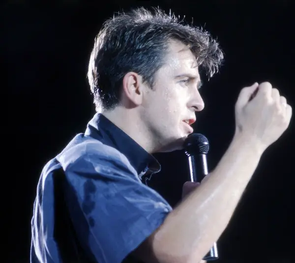 Peter Gabriel performs "Sledgehammer" at the Amnesty International benefit concert at Giants Stadium in East Rutherford, N.J., on June 15, 1986.