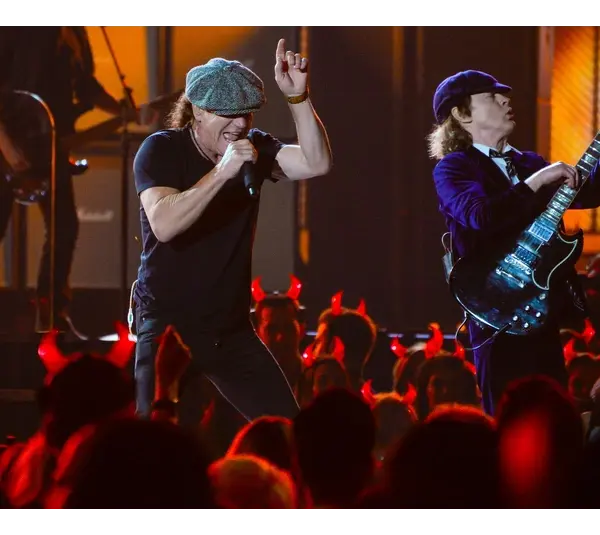 AC/DC lead vocalist Brian Johnson (left) and guitarist Angus Young performs "Rock or Bust" and "Highway to Hell" at the 57th annual Grammy Awards at the Nokia Theatre. The fans were thunderstruck.