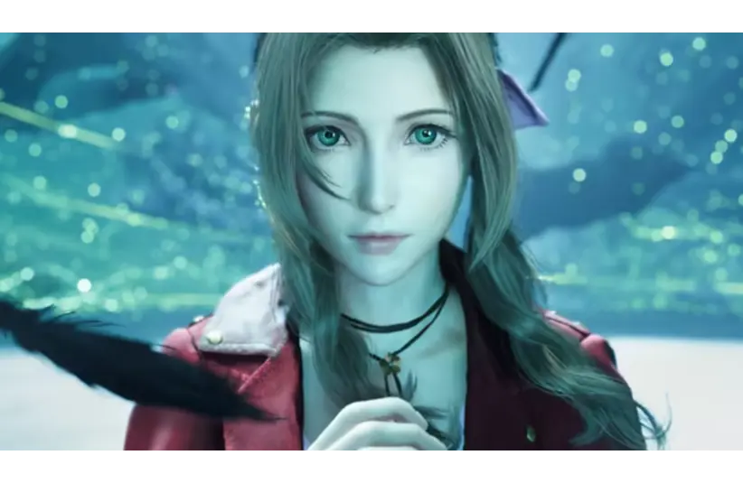 A female character with green eyes and long, light brown hair, holds a feather. She appears thoughtful, set against a glowing blue and green background. Aerith from FF7 Remake, Courtesy of Square Enix.