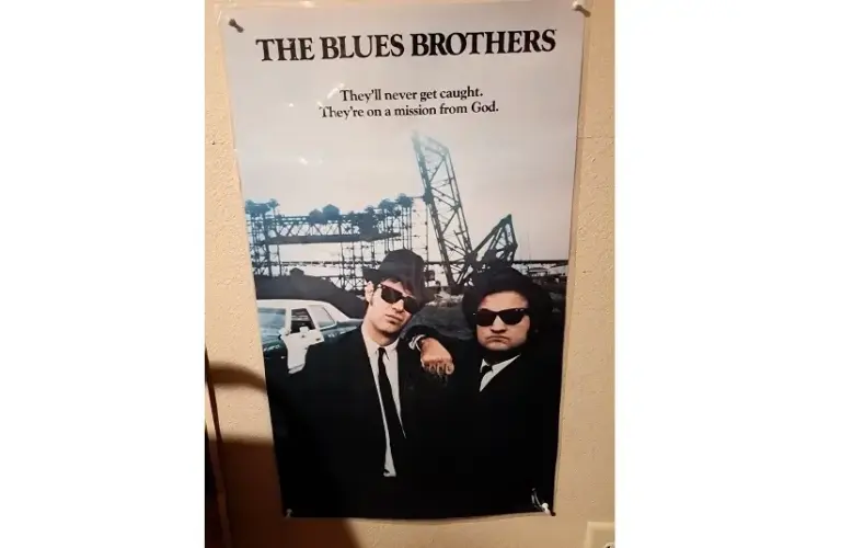 A Blues Brothers poster adorns a bar in a small Iowa town.