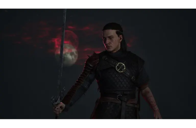 A warrior in dark armor holds a sword under a mysterious red moonlit sky. His intense expression and tattoos convey a sense of determination. Coen from The Blood of Dawnwalker, courtesy of Rebel Wolves and Bandai Namco Entertainment.