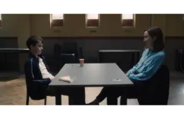 Eric Doherty, pictured with co-star Owen Cooper in a scene at a table in the Netflix series "Adolescence," won Best Performance by a Female Actor in a Supporting Role on Television at the 2026 Golden Globes.
