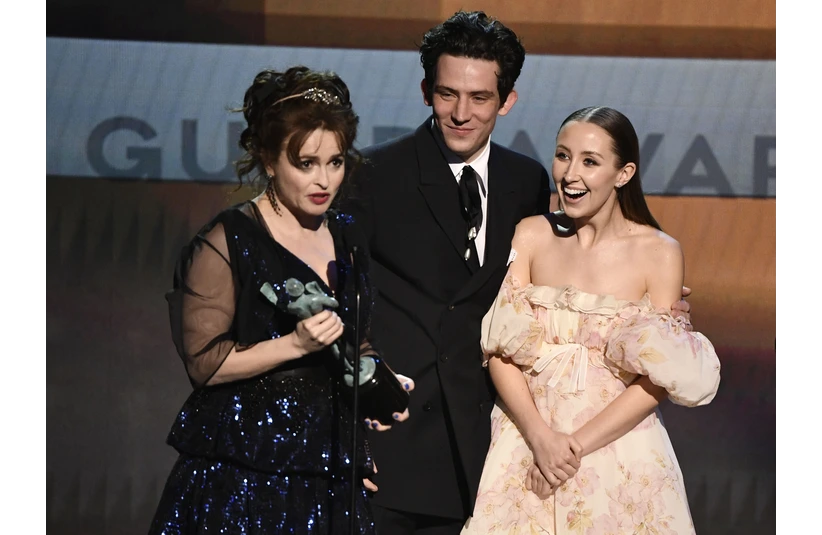 Los Angeles, CA, USA; (from left) Helena Bonham Carter, Josh O'Connor and Erin Doherty accept the award for outstanding performance by an ensemble in a Drama Series for \"The Crown\" during the 26th Annual Screen Actors Guild Awards at the Shrine Auditorium.