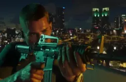 Character from Rockstar's GTA 6 holding a rifle on a rooftop at night, with a city skyline illuminated by colorful lights in the background, conveying tension and focus.