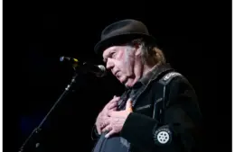 Neil Young helps to induct his longtime collaborator and friend Spooner Oldham into the Memphis Music Hall of Fame during a ceremony. Young played his first show 63 years ago today on January 31, 1963.