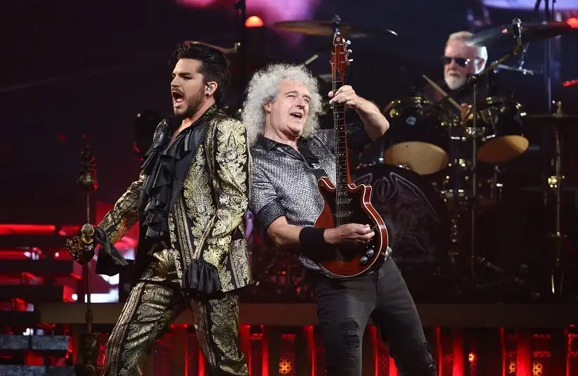Adam Lambert, Brian May and Roger Taylor of Queen + Adam Lambert perform during their Rhapsody Tour at Talking Stick Resort Arena on July 16, 2019 in Phoenix, Ariz.