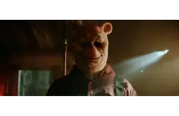 Image of Craig David Dowsett in "Winnie-the-Pooh: Blood and Honey"(2023), the first installment to "Poohniverse"