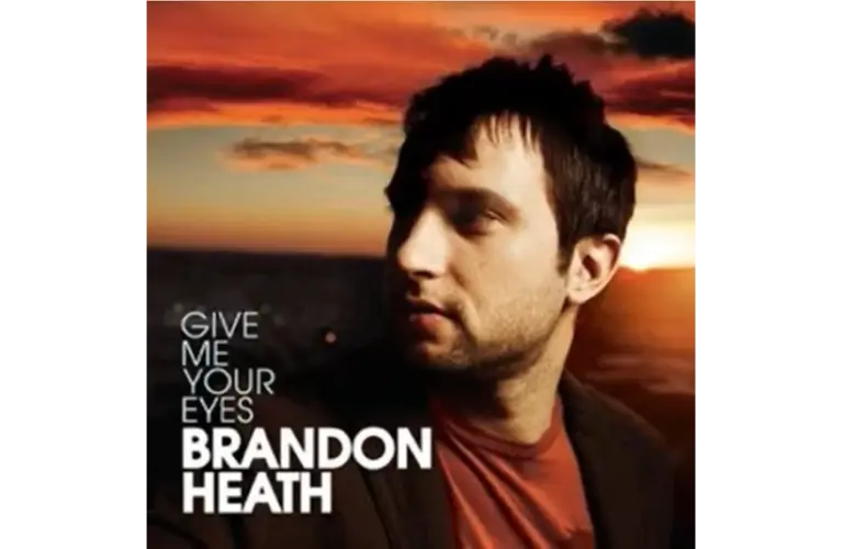 Brandon Heath stands at sunrise on the atwork of his single "Give Me Your Eyes."