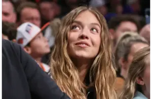 Jan 21, 2025; Brooklyn, New York, USA; Actress Sydney Sweeney sits courtside during the game between the New York Knicks and the Brooklyn Nets at Barclays Center. Mandatory Credit: Wendell Cruz-Imagn Images