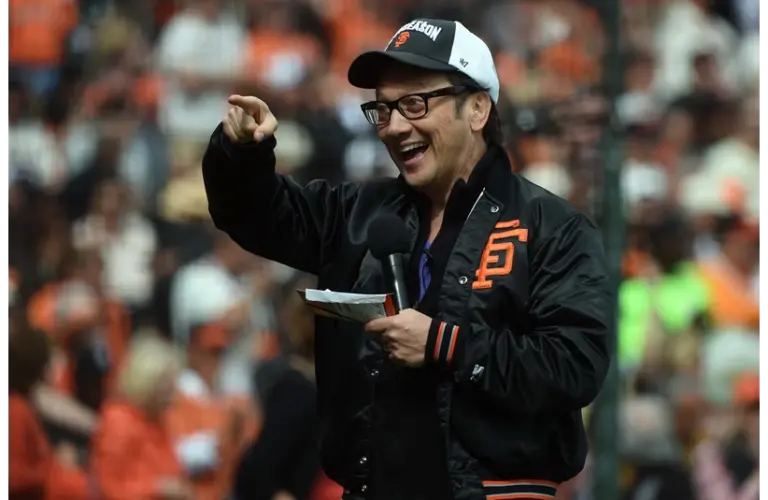 Oct 14, 2014; San Francisco, CA, USA; Film and television actor Rob Schneider cheers before game three of the 2014 NLCS playoff baseball game between the San Francisco Giants and the St. Louis Cardinals at AT&T Park. Mandatory Credit: Kyle Terada-Imagn Images