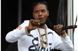 May 21, 2016; Baltimore, MD, USA; Fetty Wap entertains Infield Fest fans during the 141st running of the Preakness Stakes at Pimlico Race Course. Mandatory Credit: Mitch Stringer-Imagn Images