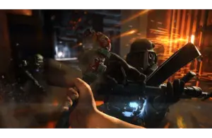 A person engages in combat with a futuristic armored soldier in a dimly lit, industrial setting. Sparks fly as weapons clash, creating a tense atmosphere. Wolfenstein: The Old Blood, Courtesy of MachineGames and Bethesda Softworks. This is not footage of Wolfenstein 3.