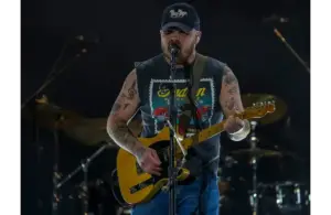 Zach Bryan arrives on stage for his headlining set on the Mane Stage at Stagecoach country music festival in Indio, Calif., Friday, April 25, 2025. His new album comes out Friday, January 9, 2026.