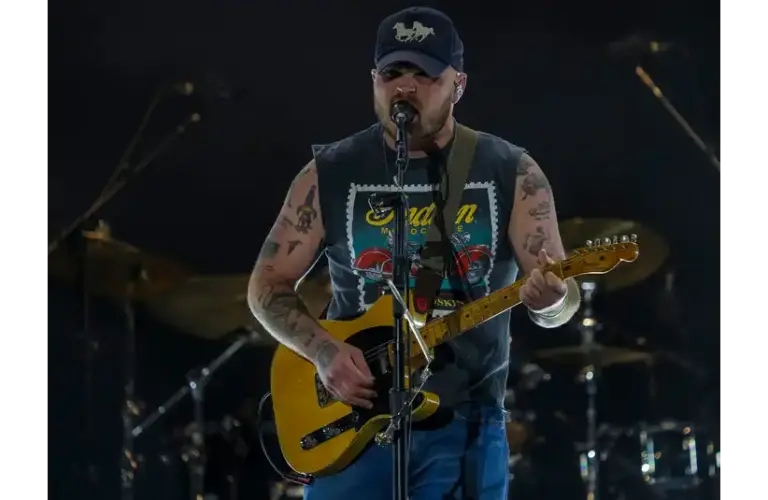 Zach Bryan arrives on stage for his headlining set on the Mane Stage at Stagecoach country music festival in Indio, Calif., Friday, April 25, 2025. His new album comes out Friday, January 9, 2026.