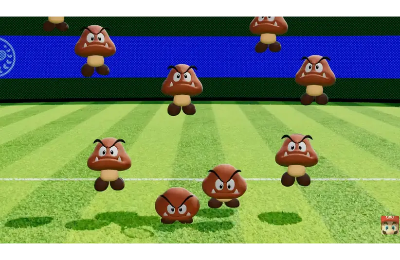 Image of multiple cartoon-like brown Goomba characters with angry expressions on a striped green field and a blue background. Playful and energetic tone.
