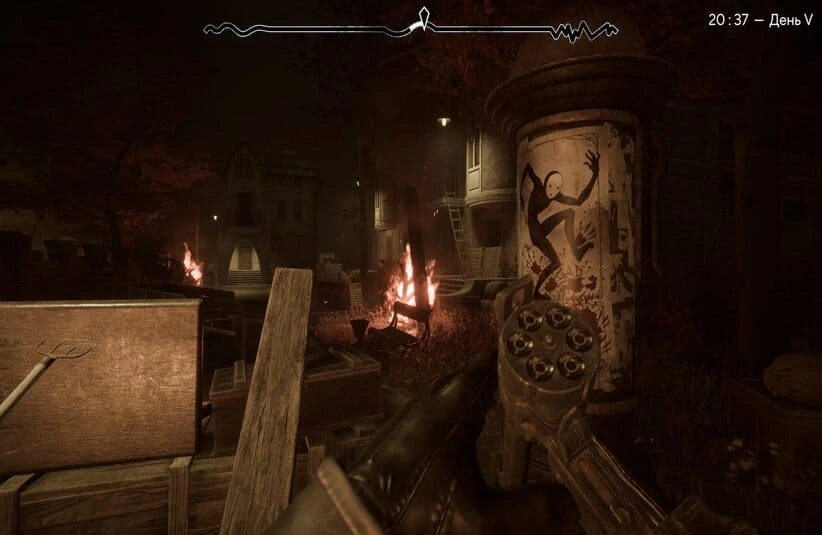 A dimly lit scene in a Pathologic 3 setting, showing a revolver held by a gloved hand pointing towards a fire-lit street. Posters on a pole depict a stylized figure. The atmosphere is tense and eerie.