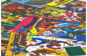 A stack of comics scattered out on display
