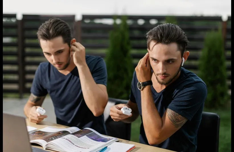In daily devotion, two brothers sit together.