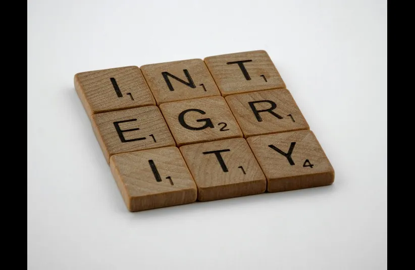 In daily devotion, the word integrity is spelled out.