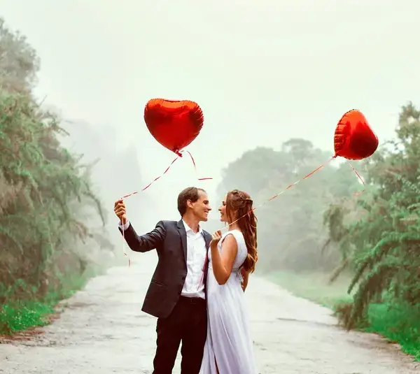 A couple on Valentine's Day showing love towards each other.