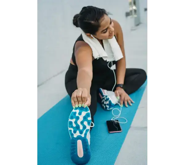 A woman performing longevity workout.