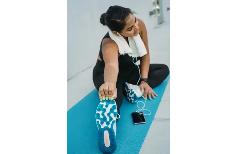 A woman performing longevity workout.