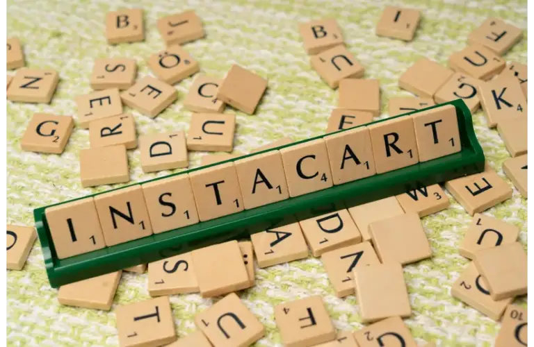 food delivery, best/A wooden block with the word instacart written on it