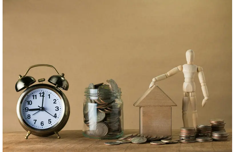 financial aid investment on a wooden table.