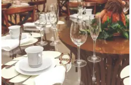 Table setting with crockery and flowers valentine dinner