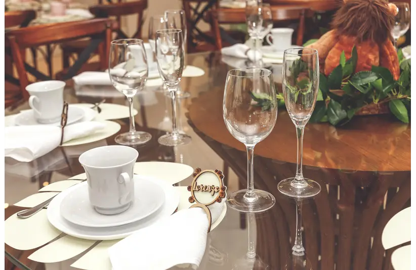 Table setting with crockery and flowers valentine dinner