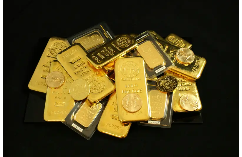 price of gold-Gold Bars and Coins on a Black Surface